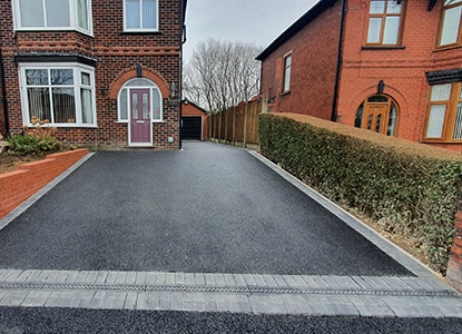 Newly installed driveway with clean finish